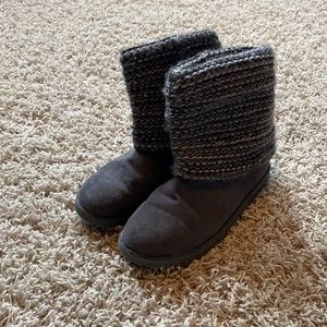 gray and sparkly uggs slightly slanted